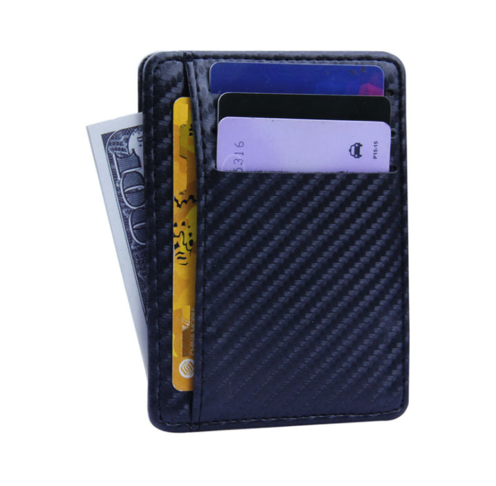 Carbon fiber patterned wallet with cards and money on a white background
